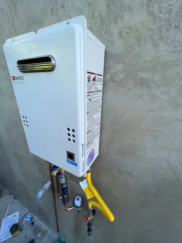 Tankless water heater installation for Peabody Town Center homes
